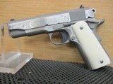 COLT 1911 ENGRAVED COMMANDER .45 ACP - 1 of 12