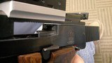 Smith & Wesson Model 41 22 LR
W/ BURRIS FASTFIRE 3 - 10 of 14