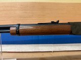 WINCHESTER 9422 XTR 22LR
WITH BOXES, RACK AND FRAMED PICTURE - 11 of 21