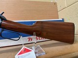 WINCHESTER 9422 XTR 22LR
WITH BOXES, RACK AND FRAMED PICTURE - 15 of 21