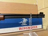 WINCHESTER 9422 XTR 22LR
WITH BOXES, RACK AND FRAMED PICTURE - 7 of 21