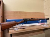 WINCHESTER 9422 XTR 22LR
WITH BOXES, RACK AND FRAMED PICTURE - 1 of 21