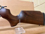 THOMPSON CENTER T/C ENCORE SS WOOD STOCK 223REM 26