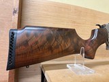 THOMPSON CENTER T/C ENCORE SS WOOD STOCK 223REM 26