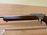 THOMPSON CENTER T/C ENCORE SS WOOD STOCK 223REM 26