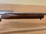 THOMPSON CENTER T/C ENCORE SS WOOD STOCK 223REM 26