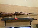 WINCHESTER MODEL 70 .300 WSM BRN LAM STOCK - 1 of 18