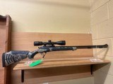 THOMPSON CENTER BONE COLLECTOR REALTREE 50 CAL MUZZLELOADER WITH SCOPE