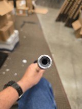 REMINGTON MODEL 7 AWR 7MM SAUM WITH LEUPOLD LPS SCOPE - Image 6 of 7