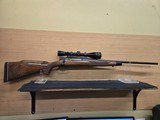 REMINGTON 700 BDL 7MM REM EXPRESS W/ LEUPOLD SCOPE