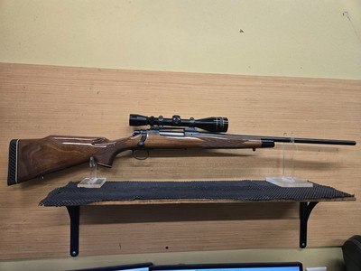 REMINGTON 700 BDL 7MM REM EXPRESS W/ LEUPOLD SCOPE - Image 1 of 11