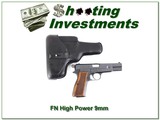 FN Hi-Power 9mm in holster - 1 of 4