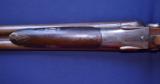 Engraved W.W. Greener Double 10 Gauge Hammer Shotgun
- 16 of 20
