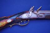 A FINE QUALITY FLINTLOCK "PENNSYLVANIA/KENTUCKY” "BENCH/" MATCH"-TYPE TARGET RIFLE" by "T. BENNETT", ca. 1840 - 1 of 25