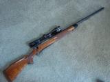Remington 700 BDL .338 Winchester Mag. with Leupold VX-III 3.5-10x40 Scope - 1 of 14