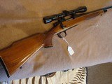 Remington Model 700 BDL.243 Winchester Embellished Model with Weaver Micro-Trac - 1 of 13