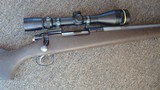 Remington 700 Custom .280 Ackley Improved with Leupold
VX-3
4.5-14x40mm Duplex - 3 of 13