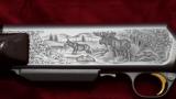 UNFIRED BEAUTIFUL 1977 BELGIUM BROWNING GRADE IV 4 IN .300 WINCHESTER MAG ENGRAVED AND SIGNED BY JEAN
MATIE BAQUE!
IN AIRWAYS CASE W/ KEY & PAPERS - 1 of 12
