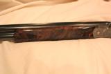 Beretta SO9 20g
28in Sidelock
Gallery
English Stock
Solid Rib Spectacular Wood - 7 of 8