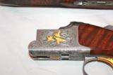 Browning 28ga Presentation P2P Lightning
with Gold
Field Style
26in IC/M - 2 of 6