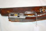 Browning 28ga Presentation P2P Lightning
with Gold
Field Style
26in IC/M - 3 of 6