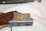 Browning 28ga Presentation P2P Lightning
with Gold
Field Style
26in IC/M - 1 of 6