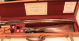 Charles S. Rosson 20ga
28in Hammer Gun
Bar Action Cased - 1 of 8