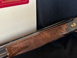 Browning Presentation P3T 12ga Superlight 26 1/2 inch M/F One of 16 made
J. Baerten engraved
1977 1st year - 2 of 8