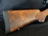 Ruger M77
77
.257 Roberts
Early Tang Safety
Knockout Wood
Leupold Scope - 4 of 12