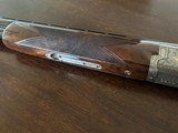 Browning Grade VI Citori 12ga
Silver Gold
28in Invectors 2 3/4 and 3 inch Round Knob Lightning. MINT - 5 of 8