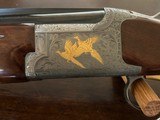 Browning Grade VI Citori 12ga
Silver Gold
28in Invectors 2 3/4 and 3 inch Round Knob Lightning. MINT - 2 of 8