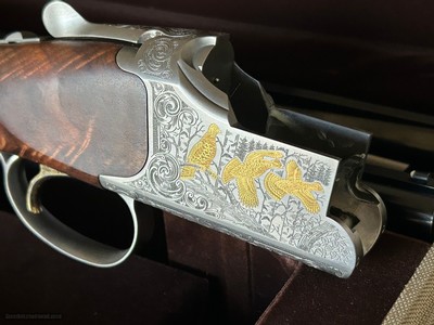 Browning Citori Grade VI
Special Edition 20/28 gauge
2 barrel
Serial Number 002. NIC. NEW Price