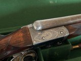 G.E. Lewis 20ga BLE
2 3/4 inch Damascus 28in
15 inch LOP to leather covered pad - 4 of 10