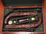 Pair of Rare .50 cal. Replica Black powder Muzzleloader Cased Pistols with Accessories - 1 of 10