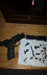 Sig Sauer P229 E2 .40 Caliber with 9 mm conversion - 1 of 5