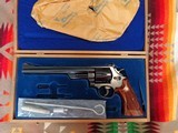 Smith & Wesson Model 29-2, 44 Magnum caliber,
8
3/8 in barrel in bright blue cased in the
original
presentation case with the tools - 1 of 6