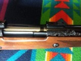 Custom
Factory Engraved
Winchester
Model
70
In Caliber
.375
H&H
Magnum
New and
Unfired - 6 of 13
