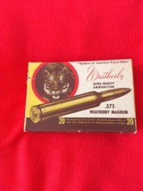 375 Weatherby factory ammo in the old animal box - 3 of 3