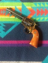 Ruger Vaquero in 45 Long Colt, with case hardened frame and blued 5 1/2 inch barrel, New in the box
