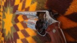 Smith & Wesson model 29-2, 8 3/8 in
Nickel, A class factory Engraved - 7 of 13