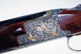 Browning custom engraved .28 gauge Superposed
- 2 of 11