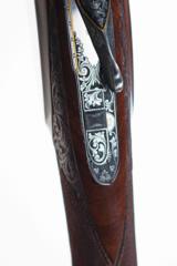 Browning custom engraved .28 gauge Superposed
- 5 of 11