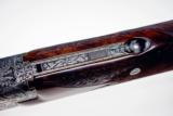 Browning custom engraved .28 gauge Superposed
- 10 of 11