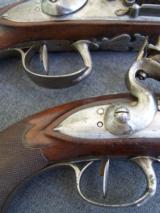 Matched pair of flintlock pistols - 19 of 22