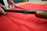 Winchester Model
52..22 LR
Custom
match
rifle with Lyman Super Target Scope on a custom RH Thumbhole Stock - 8 of 10