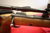 Winchester Model
52..22 LR
Custom
match
rifle with Lyman Super Target Scope on a custom RH Thumbhole Stock - 5 of 10