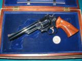 SMITH & WESSON MODEL 25-3, NEW IN BOX, WITH BOOK , CASE, KEY, MEDALLION AND EVEN OUTSIDE SHIPPING CARTON - 5 of 8
