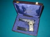 LLAMA, .22 AUTO
FACTORY ENGRAVED ,NICKEL, MATCHING BOX AND PRESENTATION CASE - 8 of 11