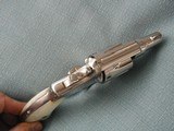 S&W PRE MODEL 10, RARE 2 " BBL. , NICKEL W/ REAL PEARL GRIPS...
.38 spl. - 4 of 7