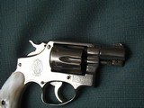 S&W PRE MODEL 10, RARE 2 " BBL. , NICKEL W/ REAL PEARL GRIPS...
.38 spl. - 6 of 7